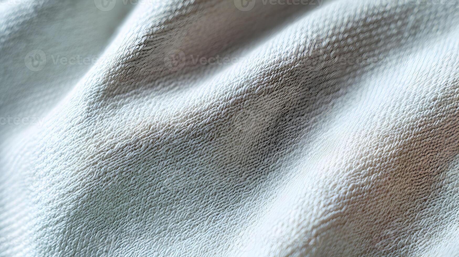 Subtle texture of soft draped fabric showcases its delicate weave and gentle folds for a soothing visual experience photo