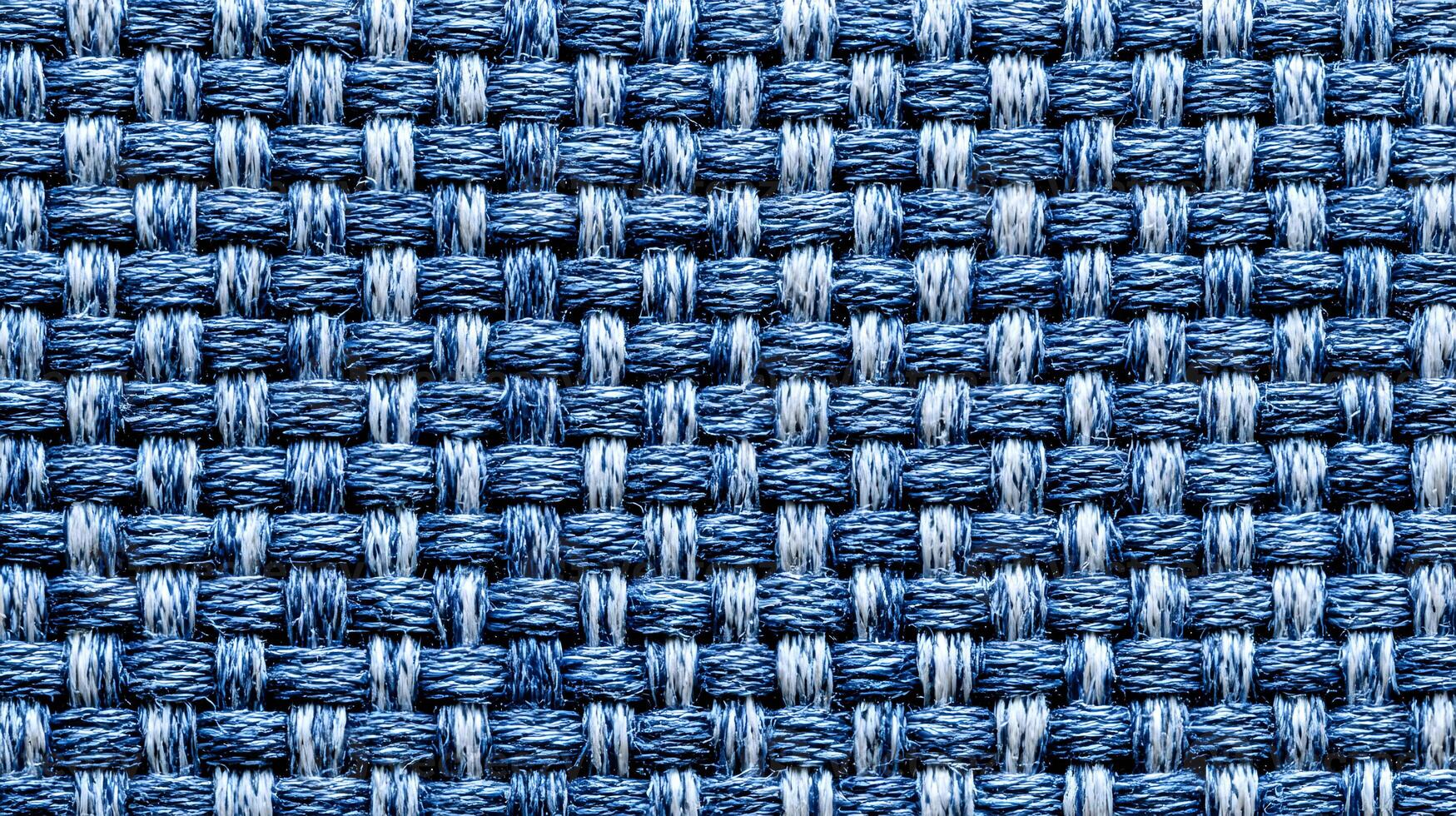 Detailed macro shot of woven blue and white fabric, showcasing textile pattern and intricate texture photo