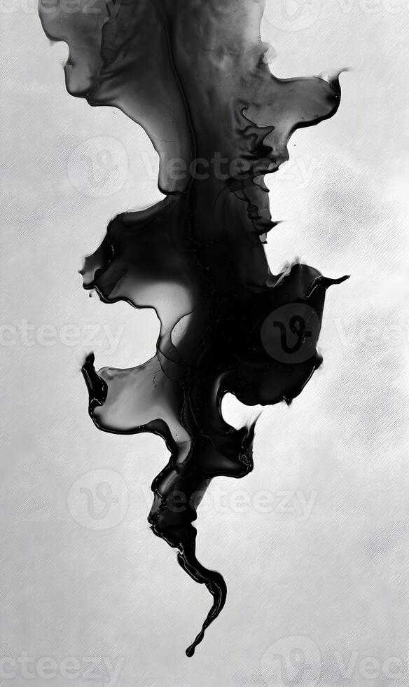Abstract black ink cloud against a soft white background creating a dreamy ethereal atmosphere and feeling photo