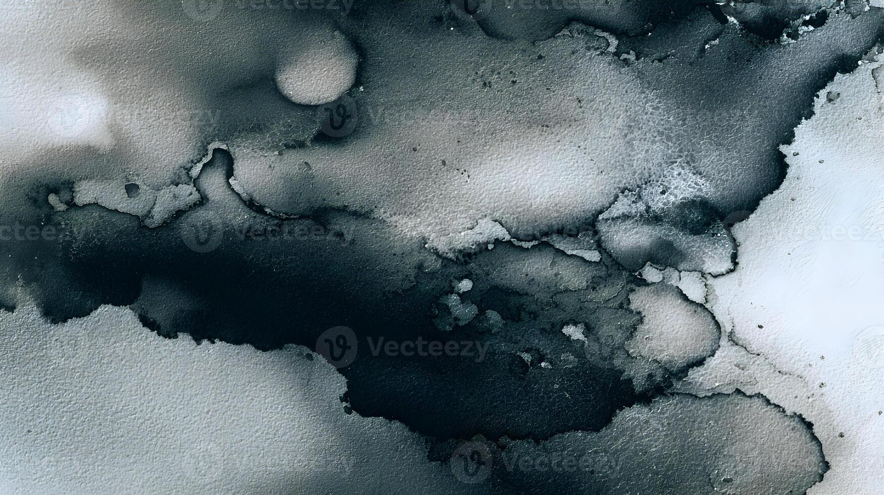 Abstract ink wash painting with dark and light tones creating a fluid marbled effect background photo