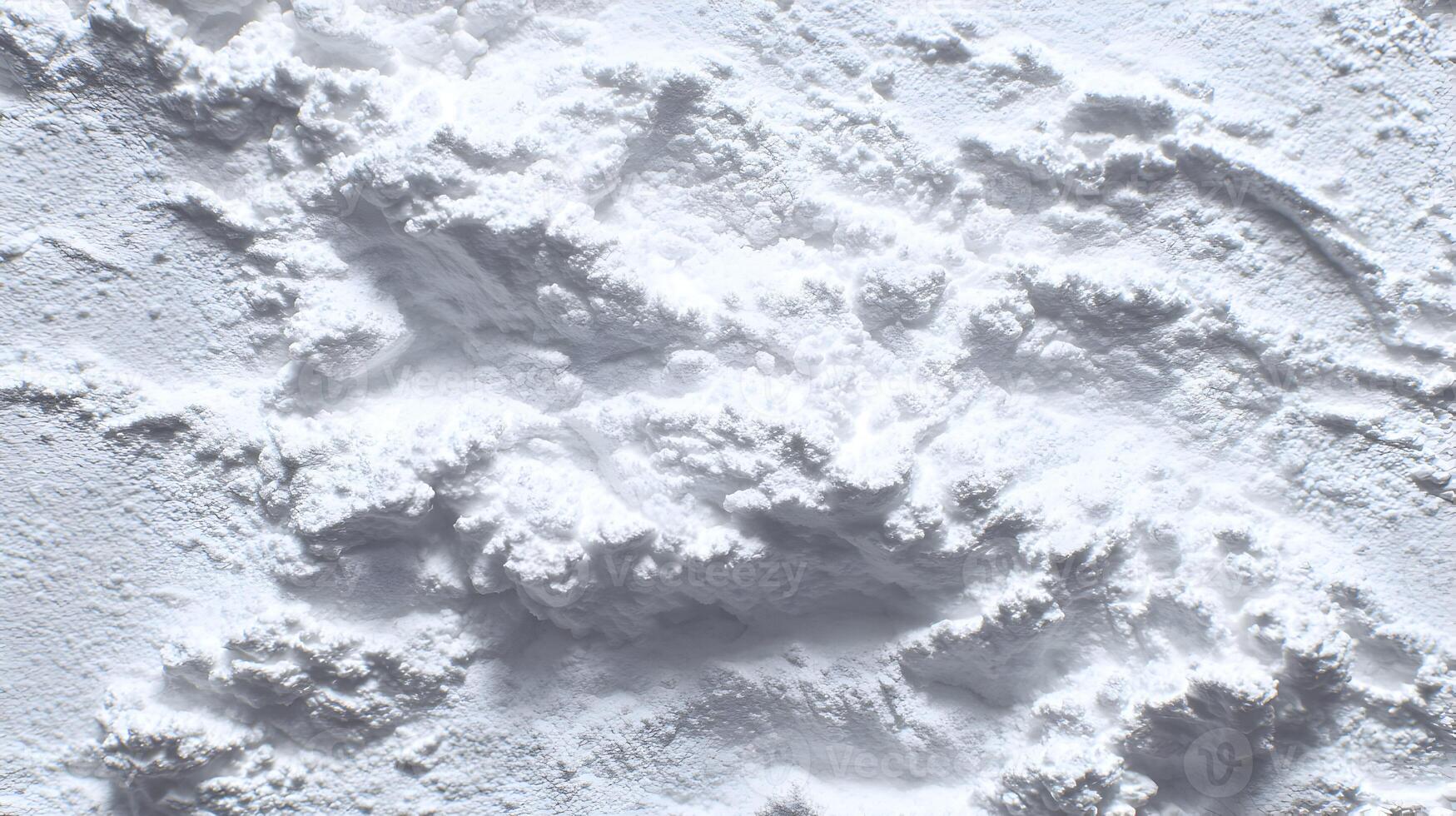 A close up shot reveals the intricate and textured surface of pure white powder forming abstract patterns photo