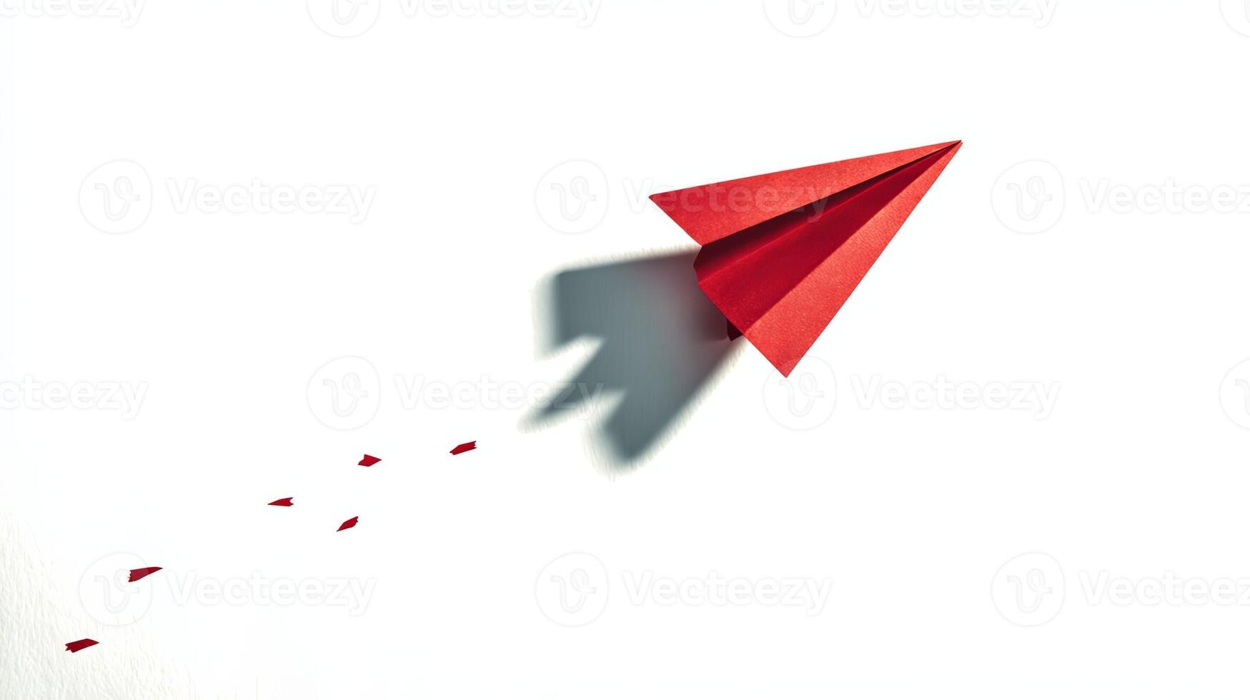 Vibrant Red Paper Airplane Soaring in the Sky photo