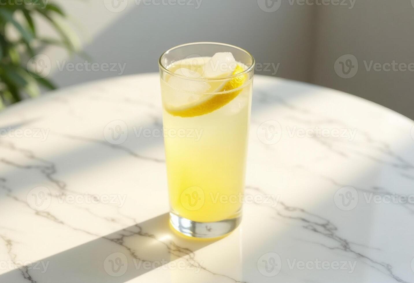 A lemonade drink with ice and a slice of lemon photo