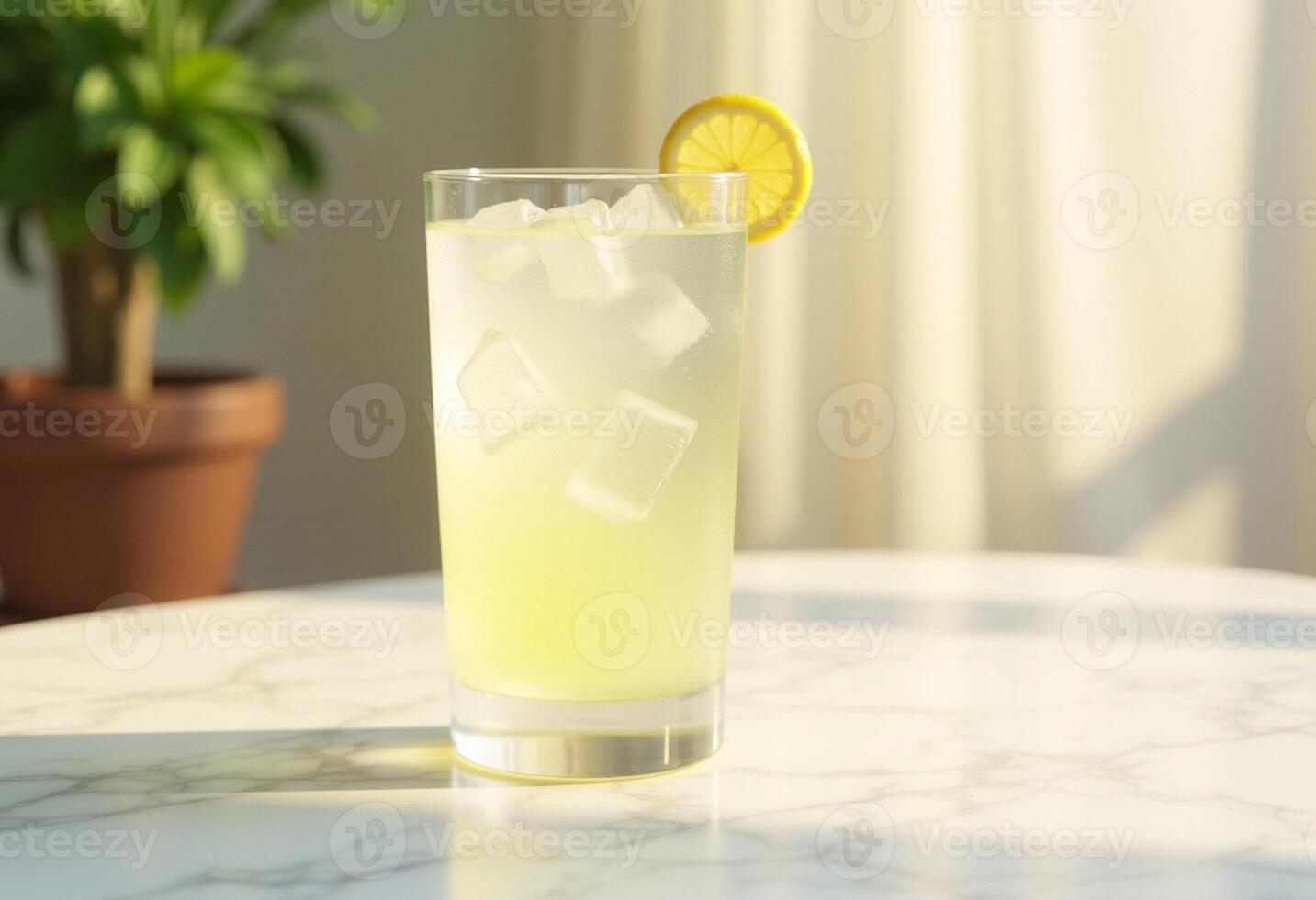 A lemonade drink with ice cubes on top photo