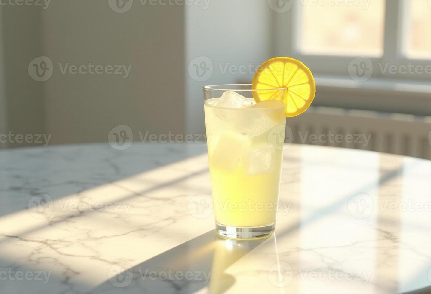 A lemonade drink on a table with a window in the background photo