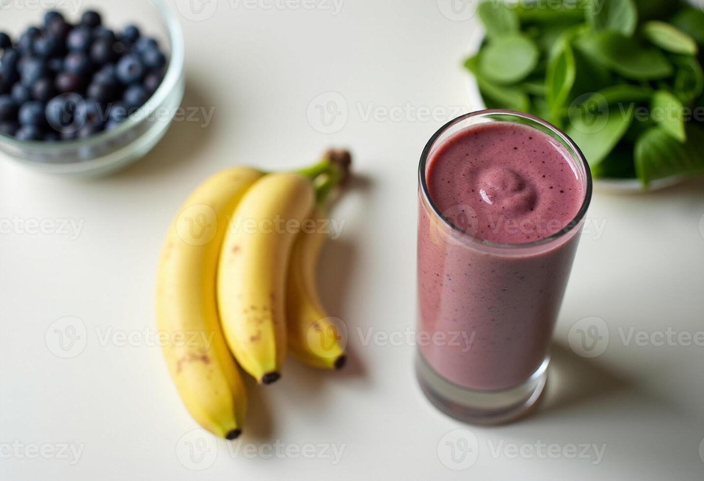 A smoothie with blueberries and bananas photo