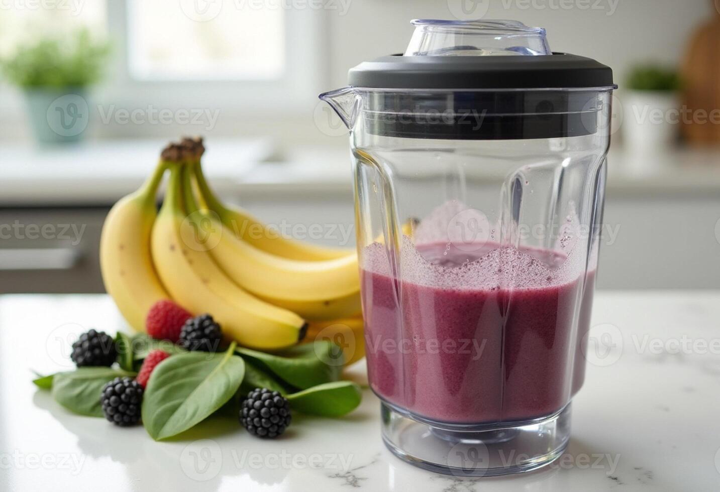 A blender with a banana, berries and a smoothie photo