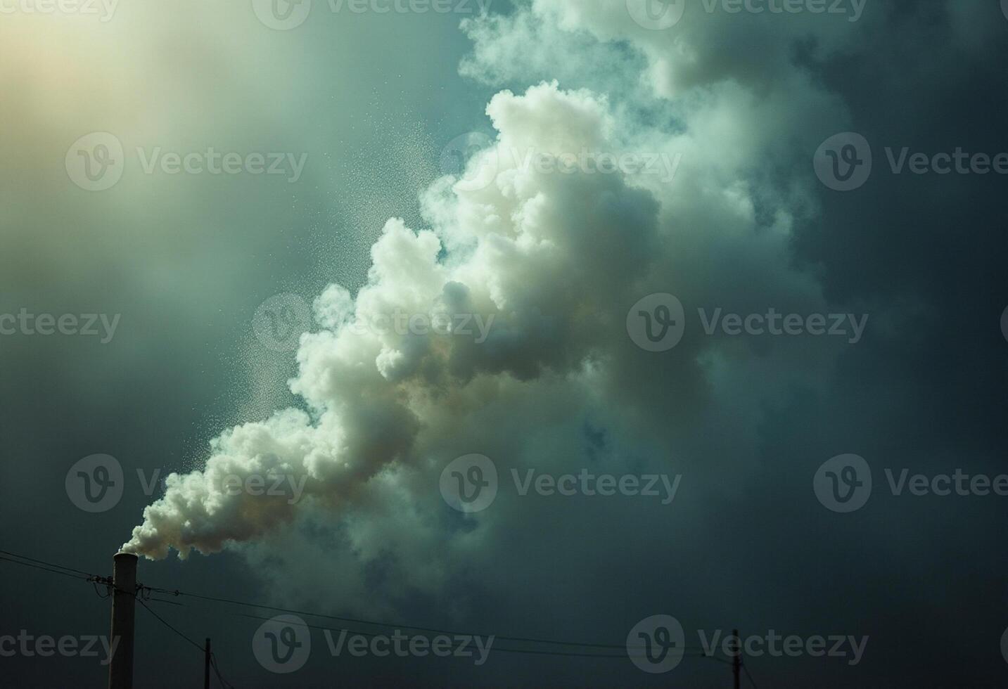 A smoke stack is seen in the sky photo