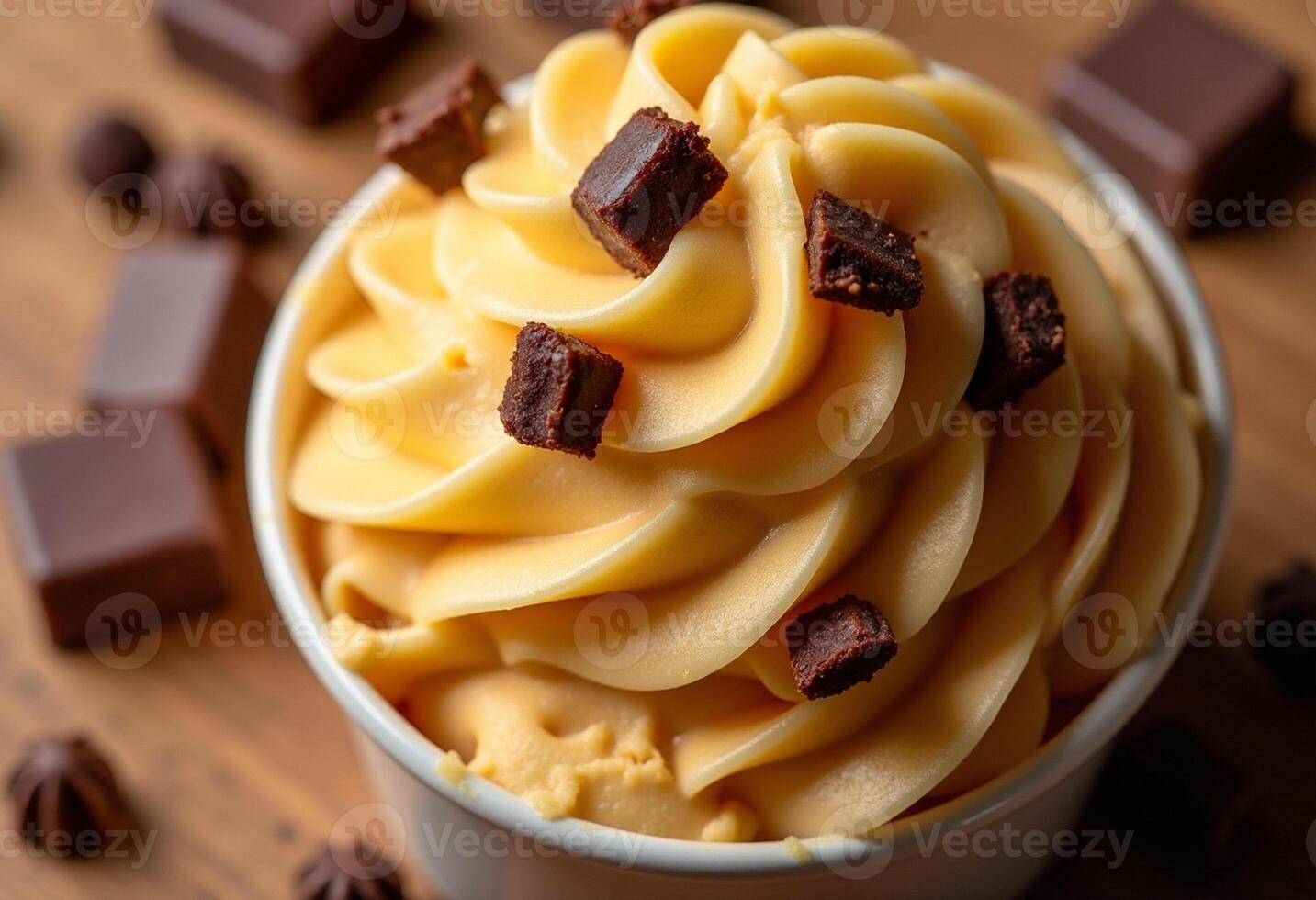 A cup of ice cream with chocolate chips photo