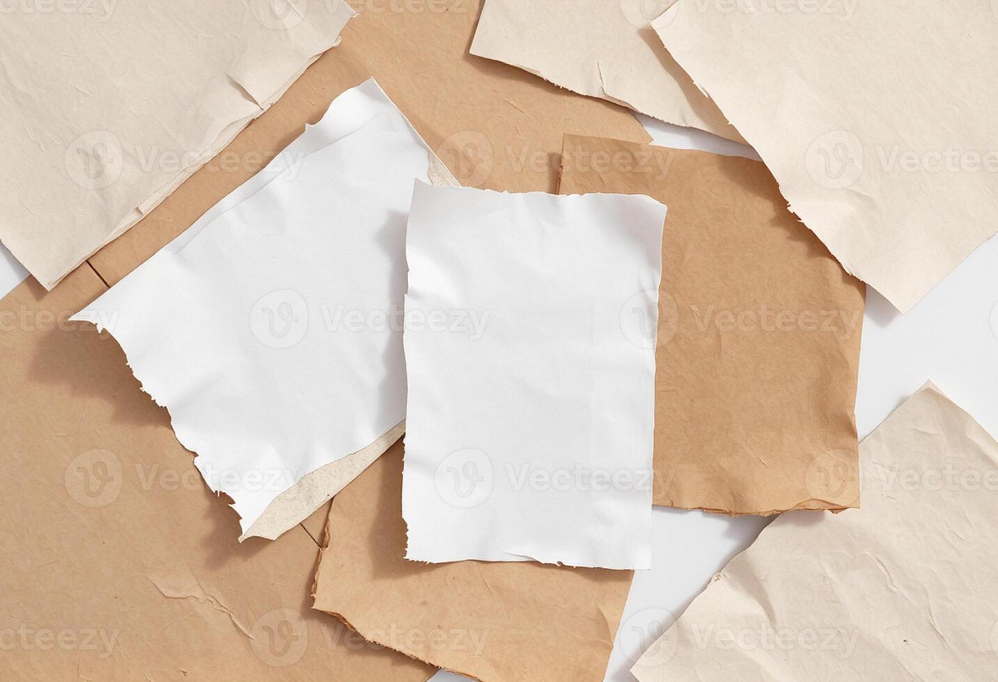 Several pieces of brown paper with one piece missing photo