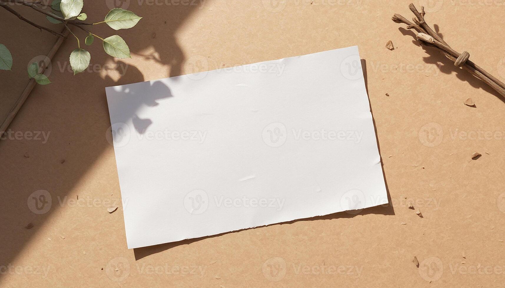 Blank paper on a brown surface with a plant photo