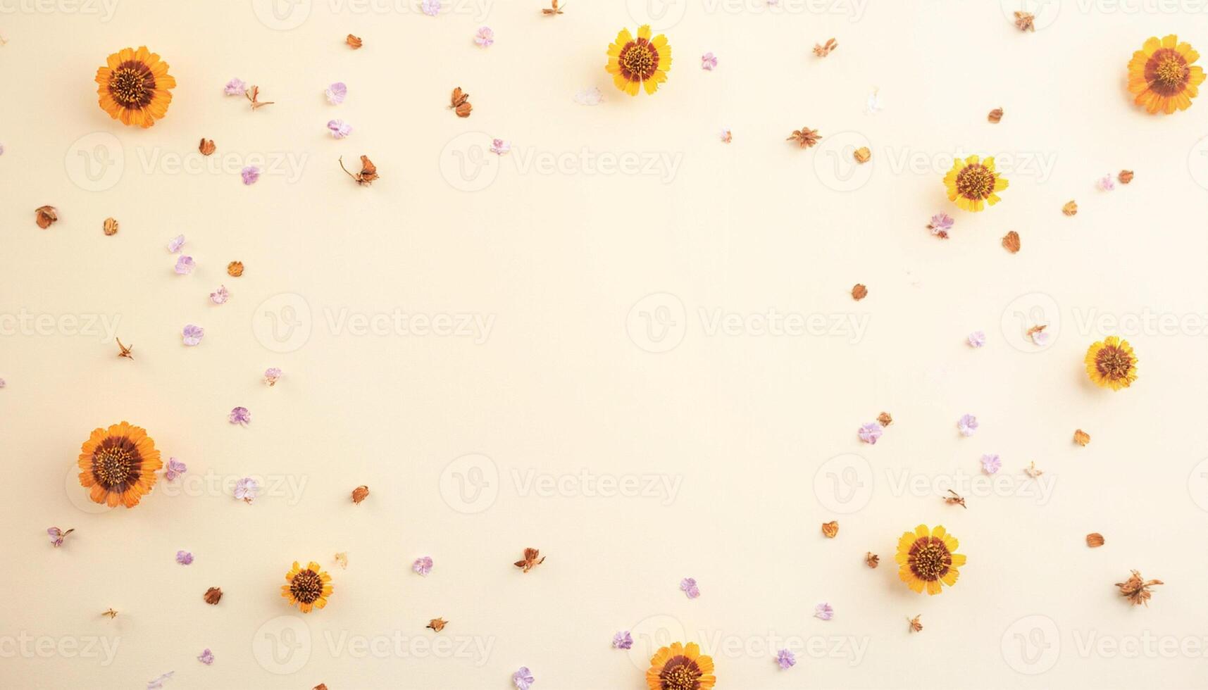 A white wall with a bunch of sunflowers and other flowers photo
