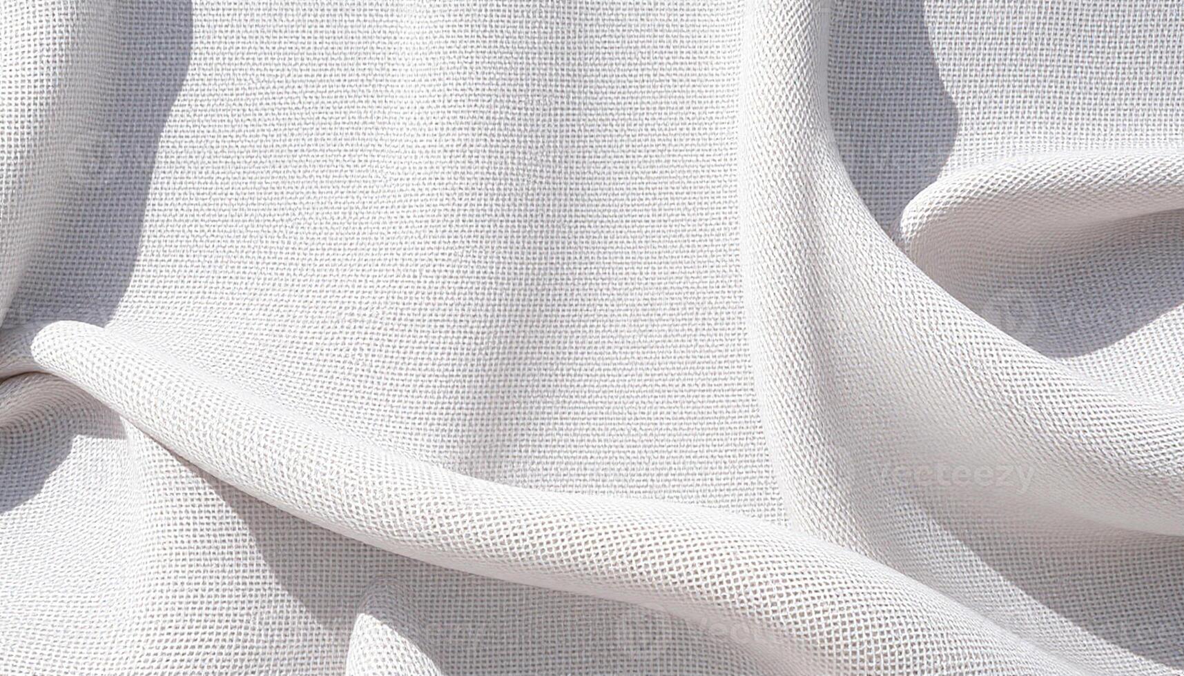 A white fabric with a pattern of wavy lines photo