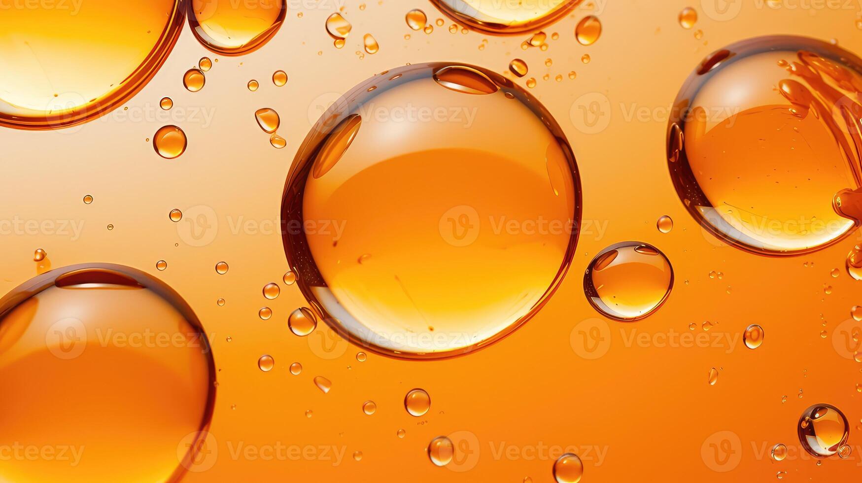 close orange oil drops photo