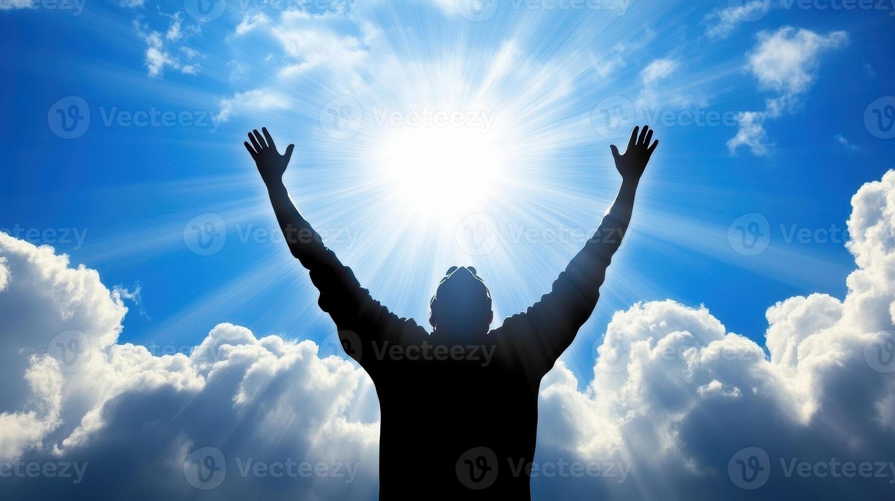 Reaching for the Sky A Silhouette of Hope and Inspiration Beneath a Radiant Sun photo