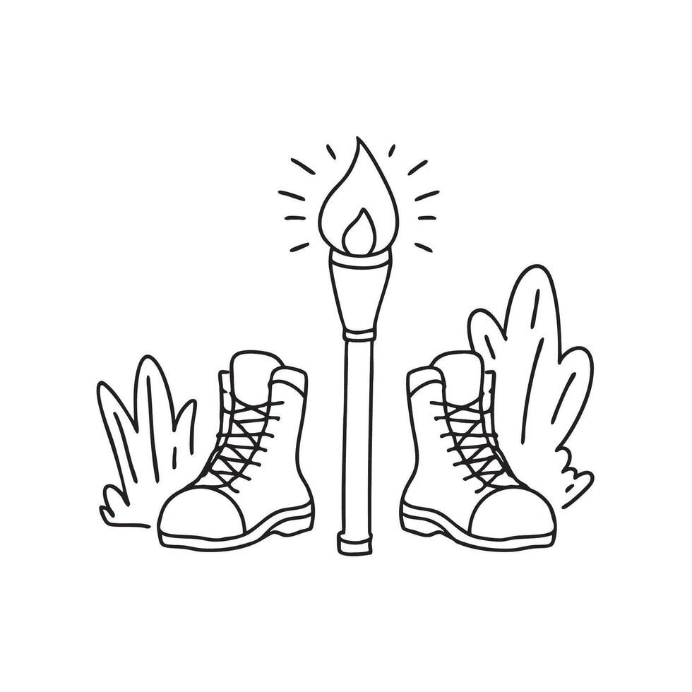 A torch placed near a pair hiking boots vector