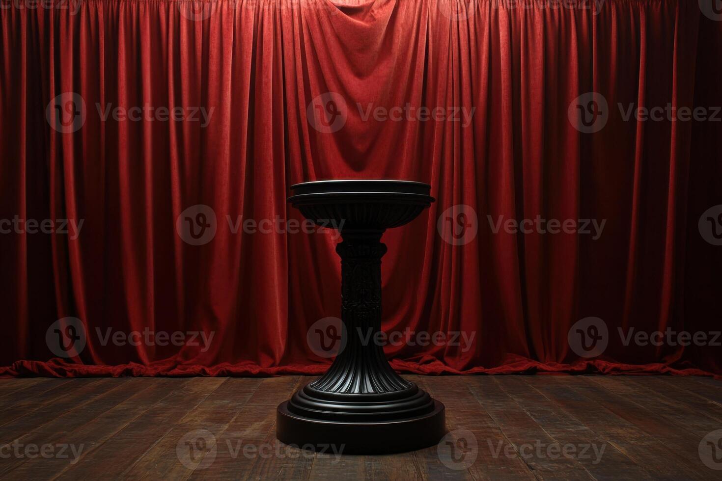 a pedestal in front of a red curtain photo