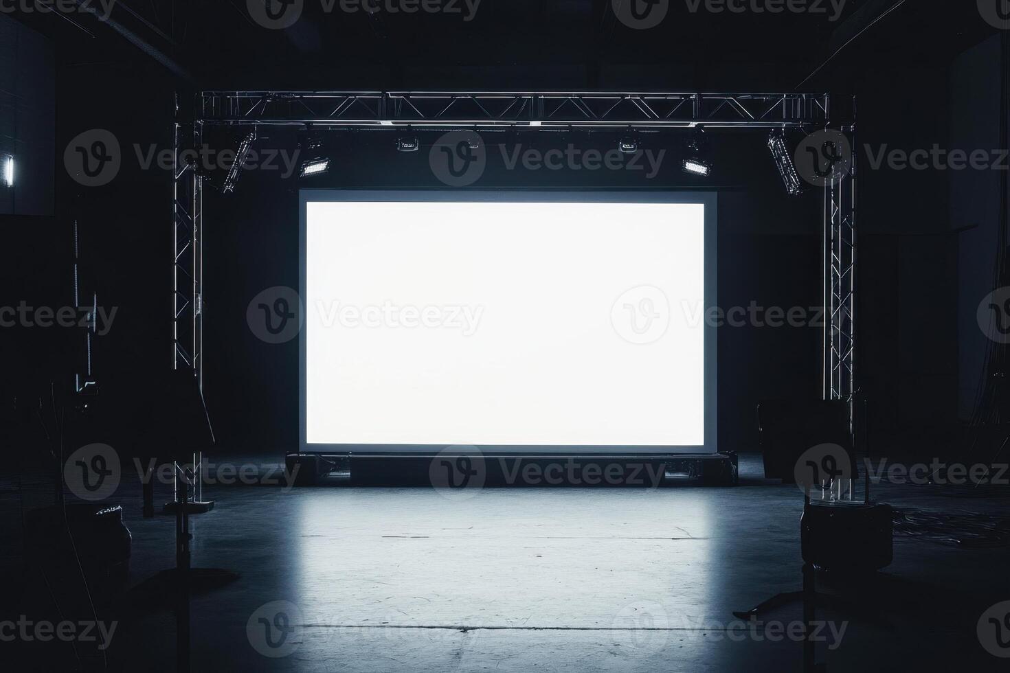 an empty stage with a large screen photo