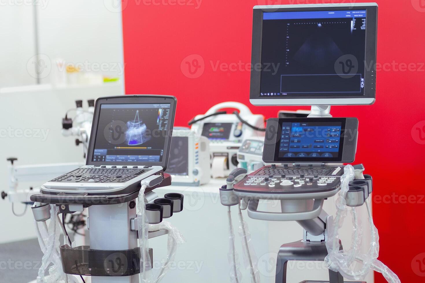 Modern medical ultrasound scanners in the exhibition hall photo
