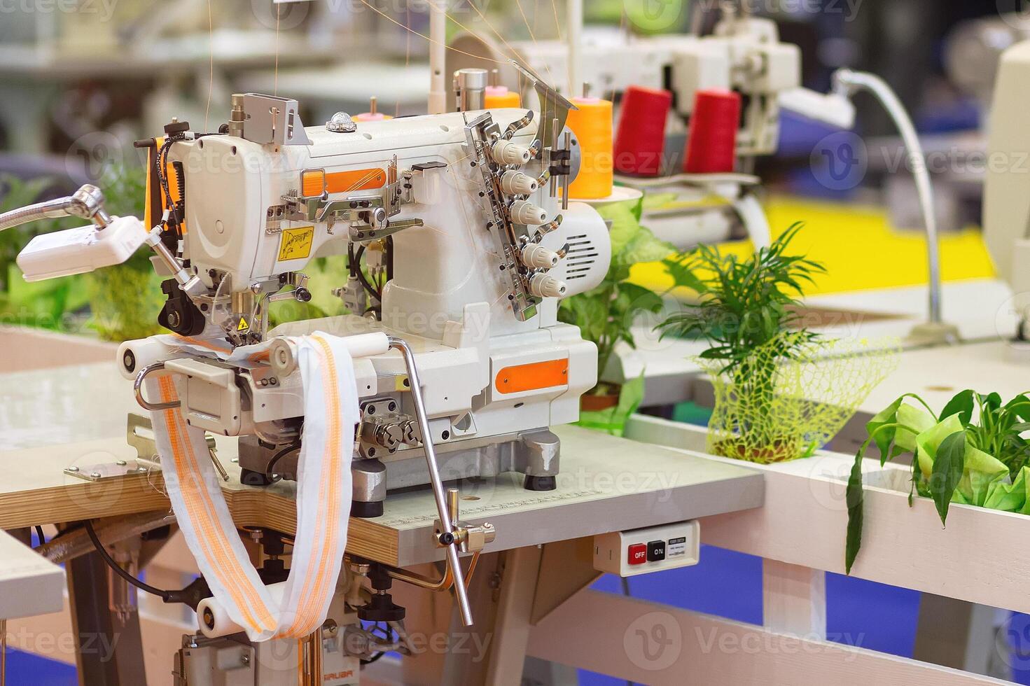 Modern computerized bartacking sewing machine at the factory photo