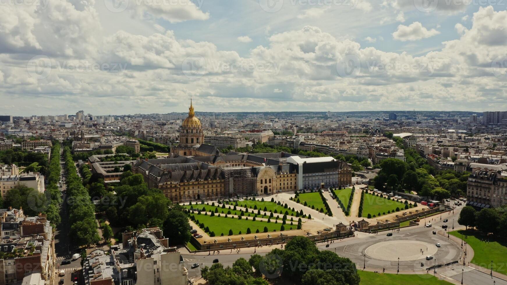 Architectural complex and park area of Les Invalides in the historic center of Paris, bird's eye view on a cloudy day. Cityscape of Paris from drone, France - historic photo