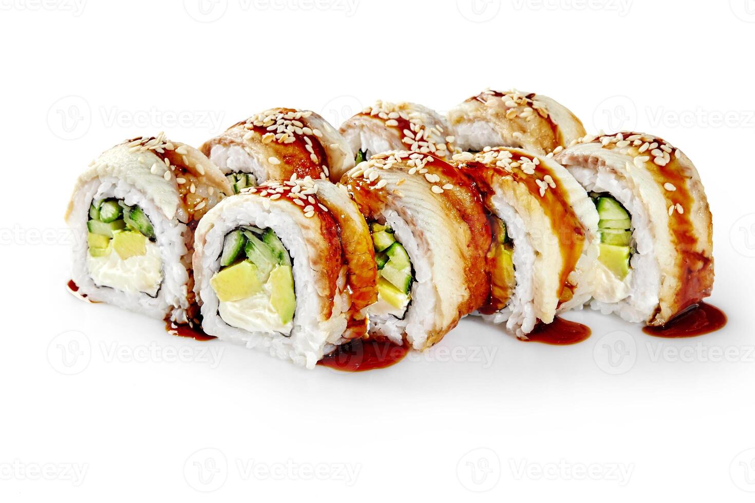 Delicious sushi rolls with eel, avocado, cucumber, cream cheese, sesame and unagi sauce on white background photo