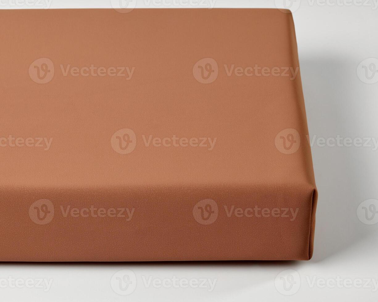 Smooth orange surface creating a warm and minimalist background photo