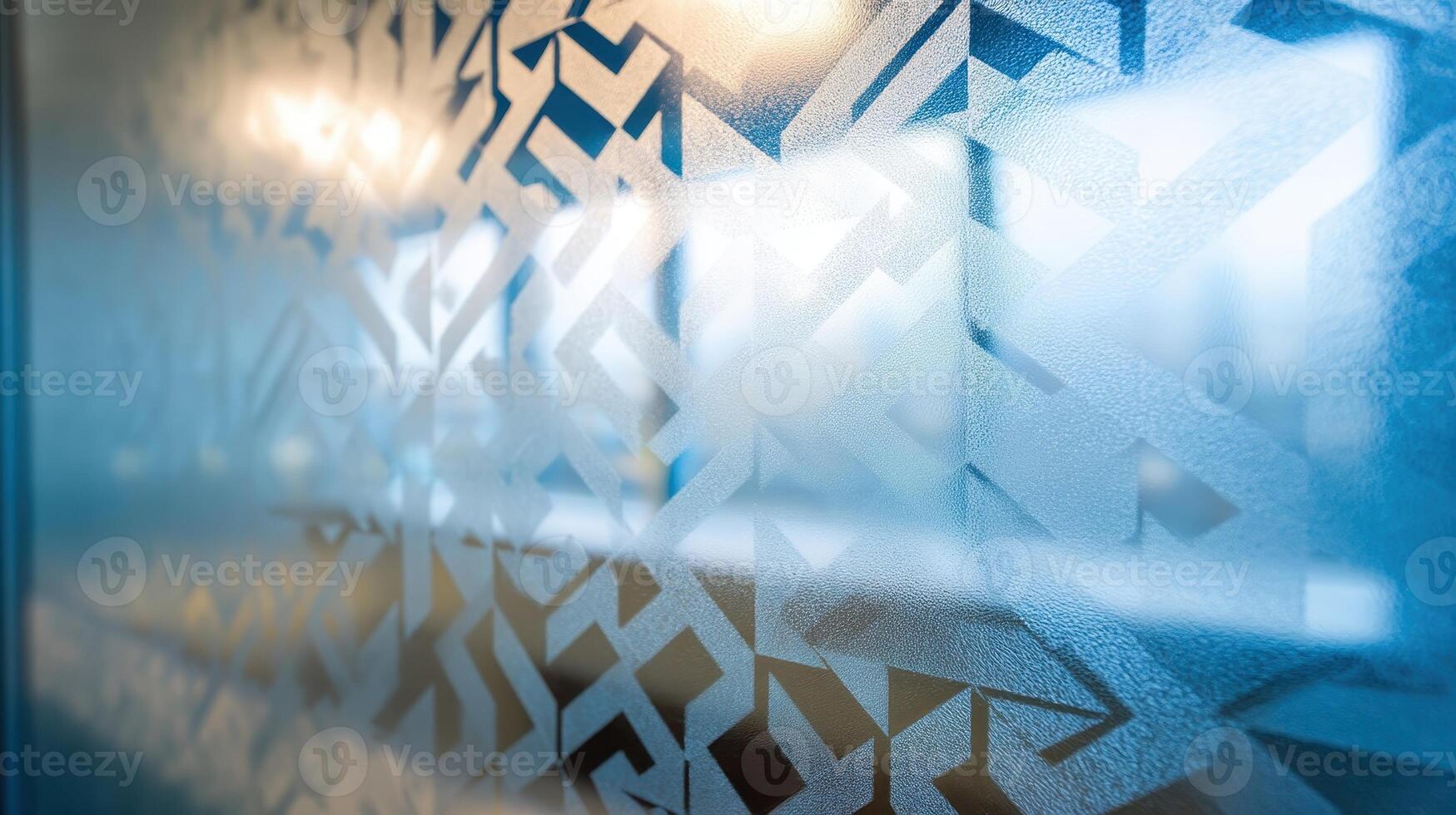 Geometric etched pattern on a glass surface creating an artistic visual experience photo