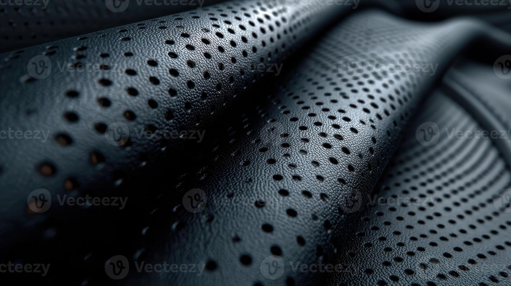 Jet black leather texture showcasing intricate patterns and perforations in a striking close up view photo