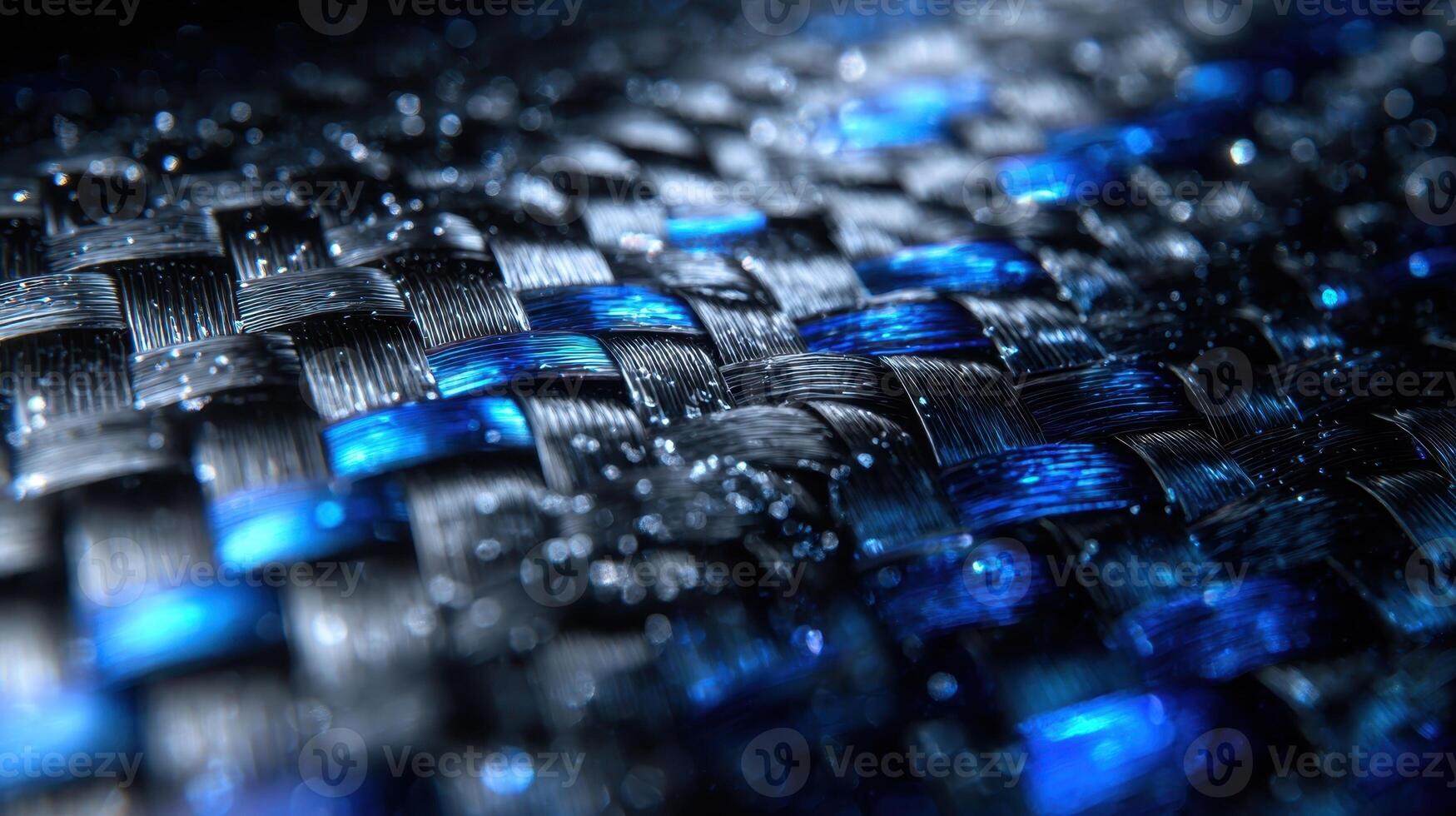 Close up view of elaborate forged carbon fiber weave showcasing intricate patterns and textures photo