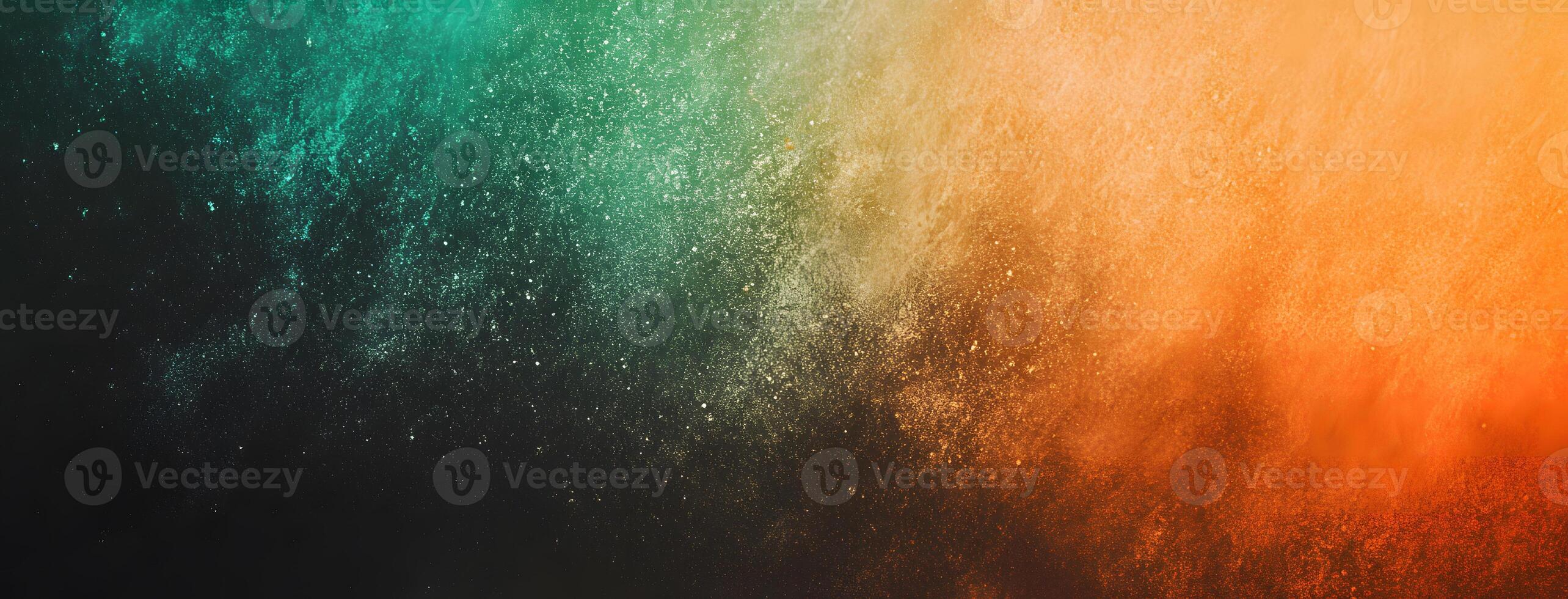 A burst of vibrant teal and orange powder creates an elegant abstract design photo
