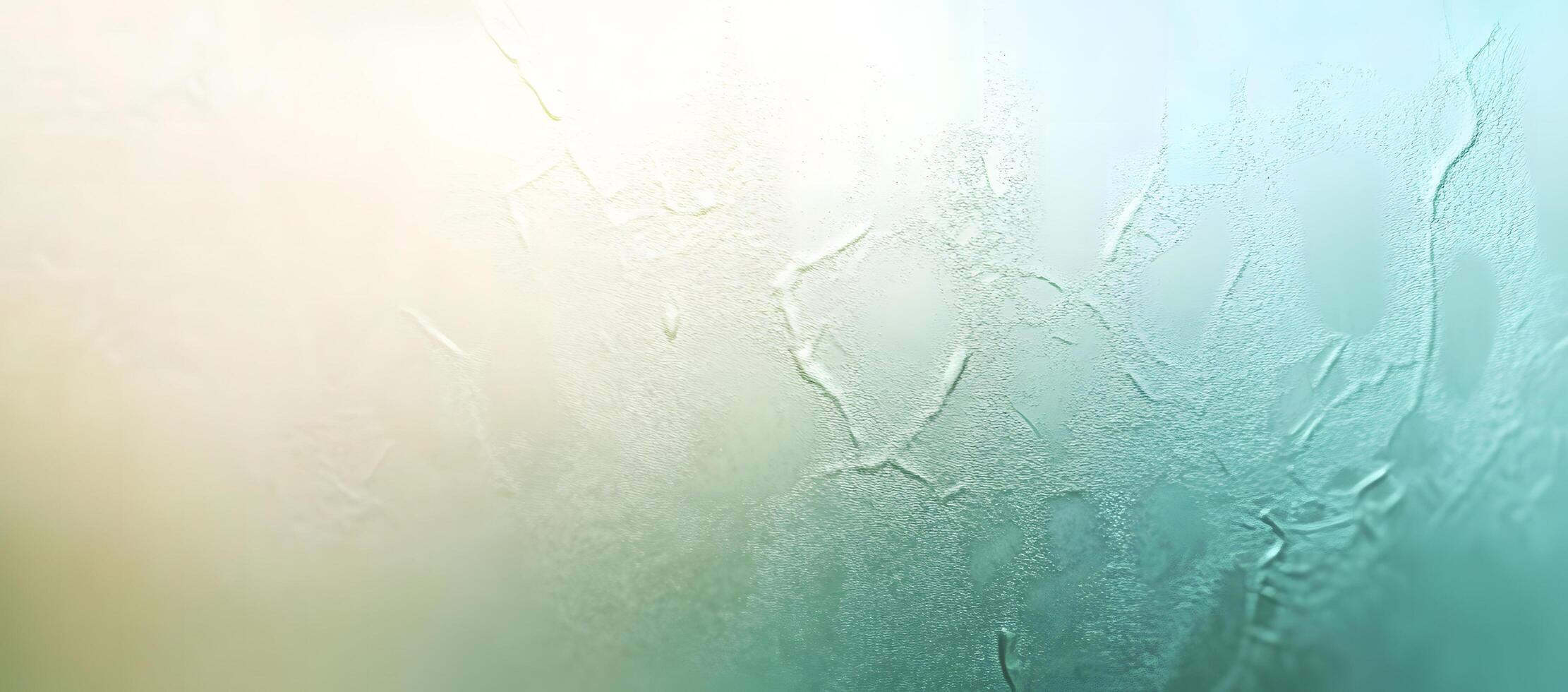 Abstract textured background showcases light patterns on a misty, light blue and green surface photo