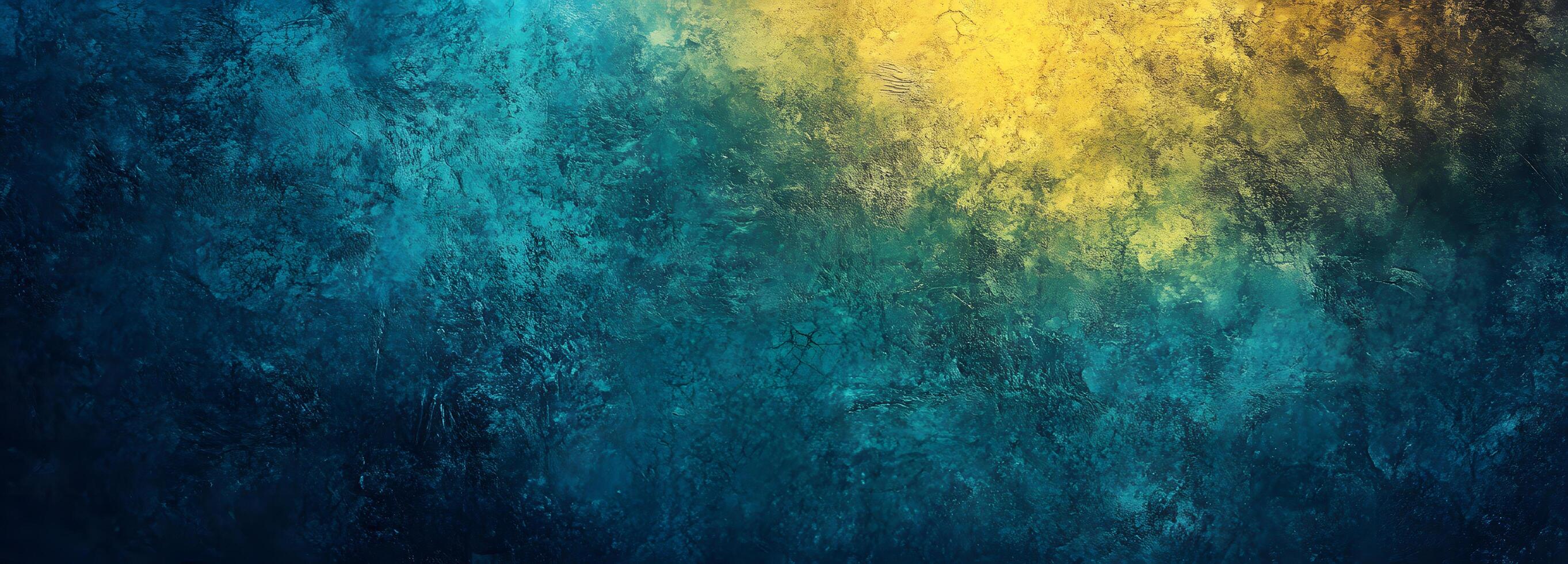Abstract textured surface transitions from vibrant yellow to deep turquoise in a mesmerizing pattern photo