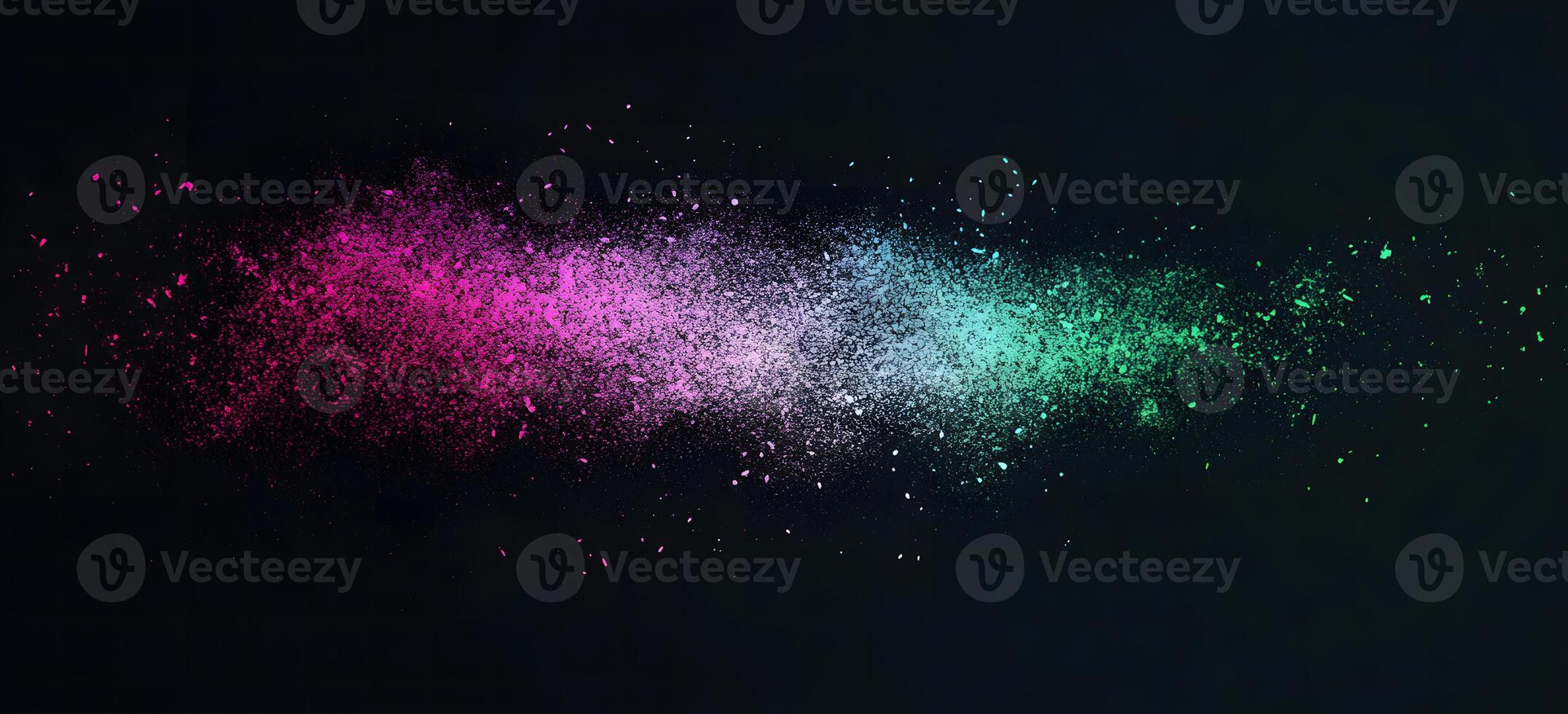 Colorful powder explosion creates a vibrant burst of pink, white, and green particles on dark background photo