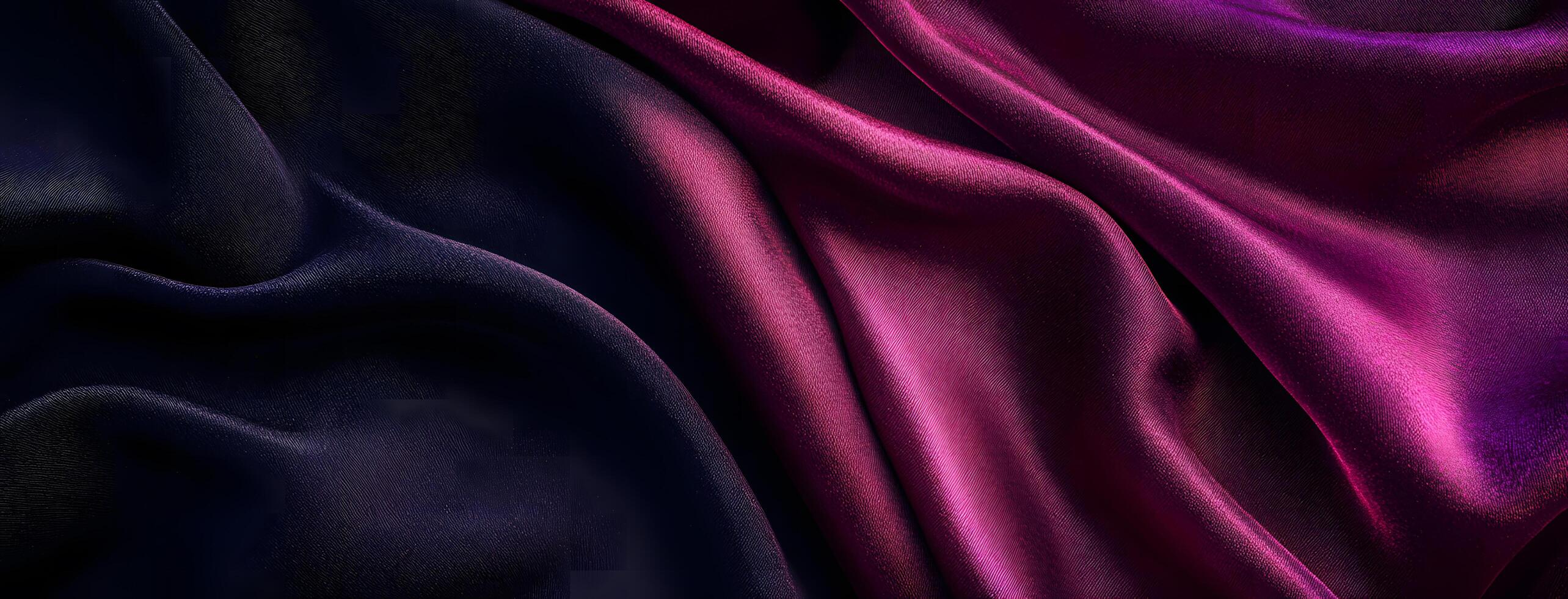Dark purple silk fabric contrasts with vibrant magenta satin folds in abstract arrangement photo