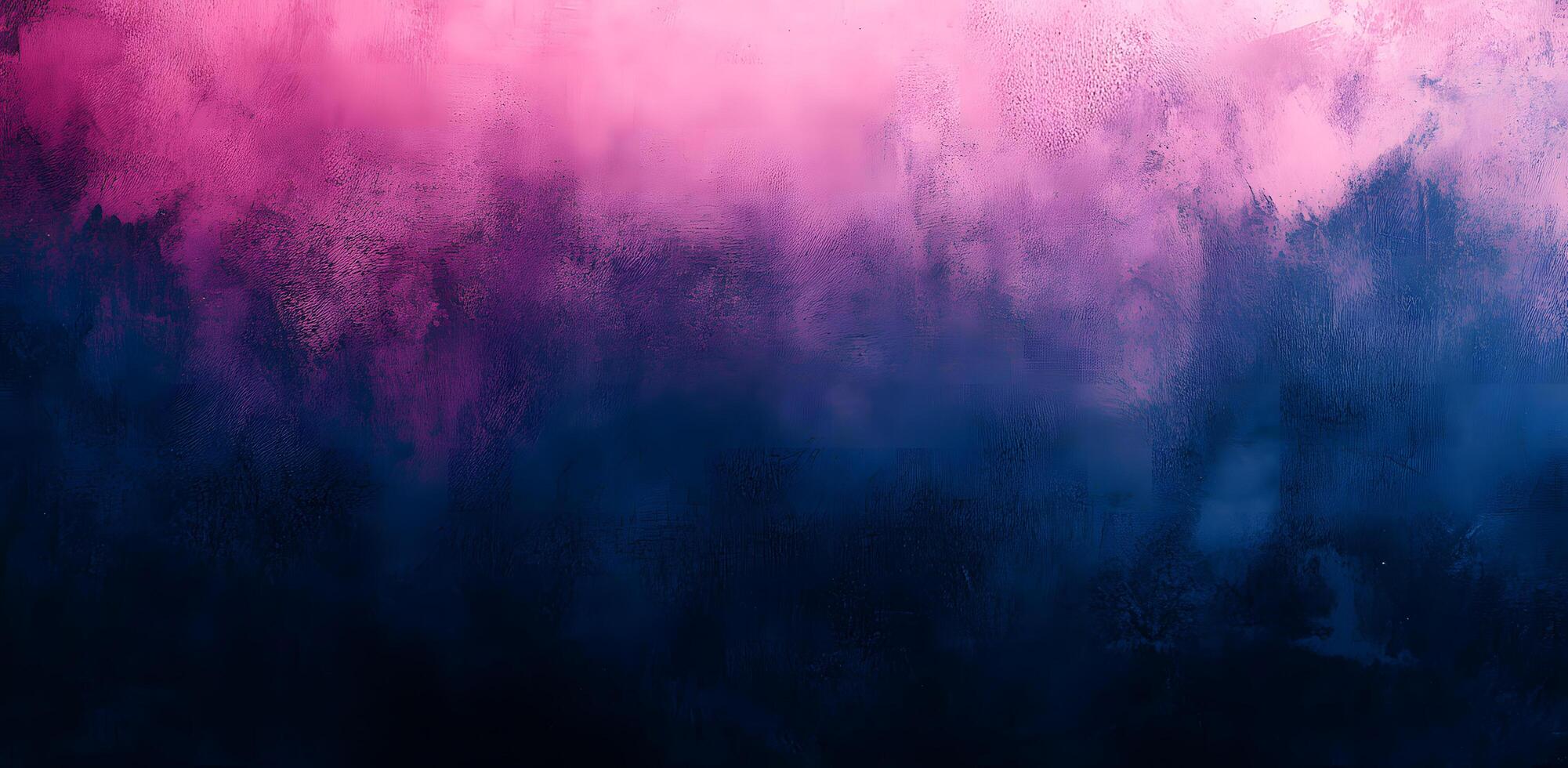 Delicate pink diffuses into inky blue creating a deeply atmospheric and textured background photo