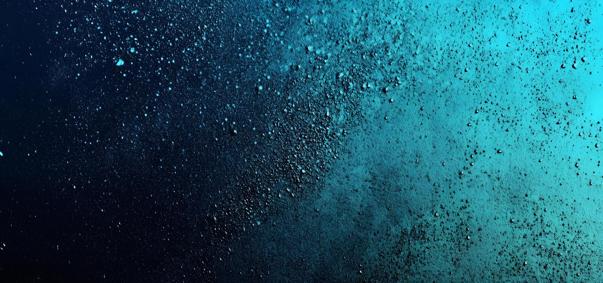 Dense turquoise abstract field with grainy texture transitions into dark navy blue night photo