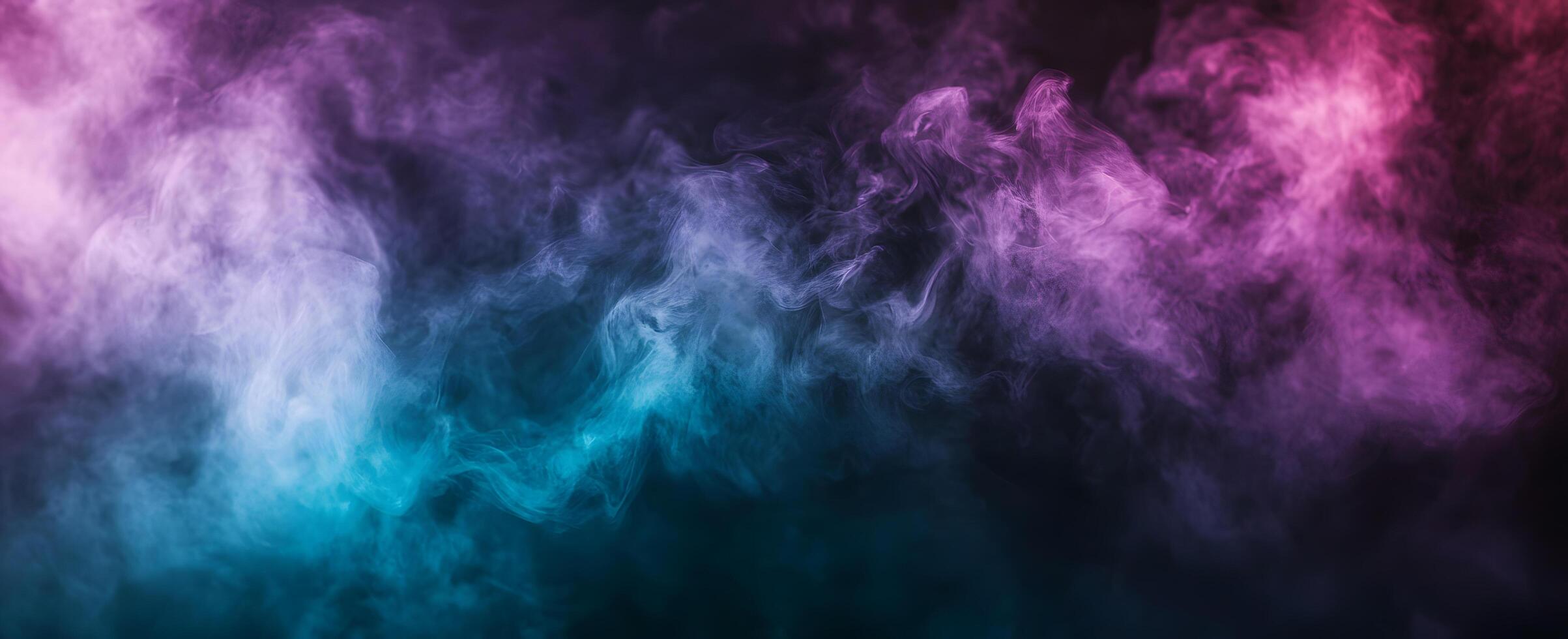 Swirling clouds of ethereal smoke transition from teal to vibrant magenta on a dark backdrop photo