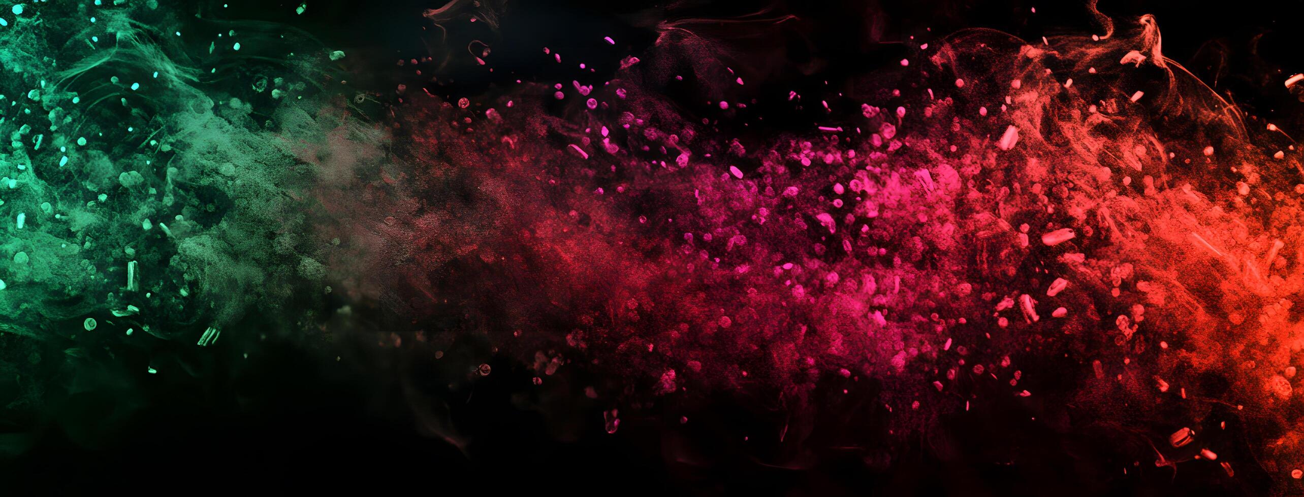 Teal and pink dust clouds create a mesmerizing burst on a stark dark background photo