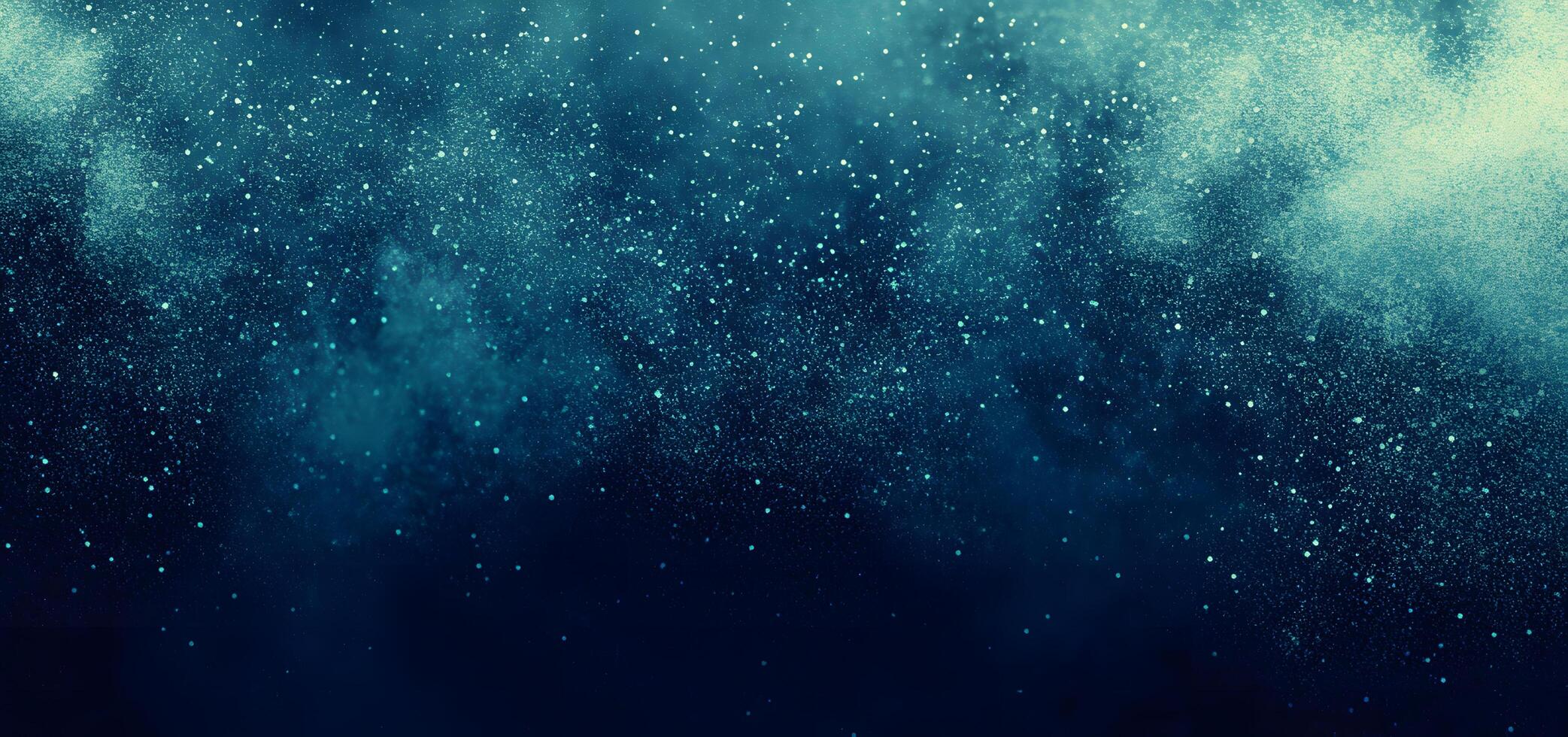 Teal glitter is scattered across the dark blue background, creating a magical, sparkling effect photo