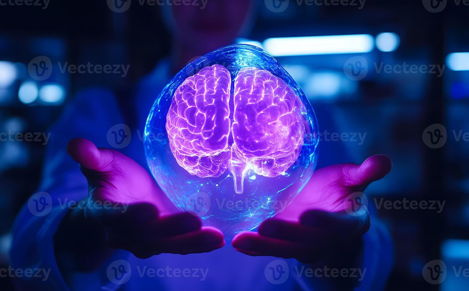 Glowing brain floats within a luminous sphere held gently in open hands under moody lighting photo
