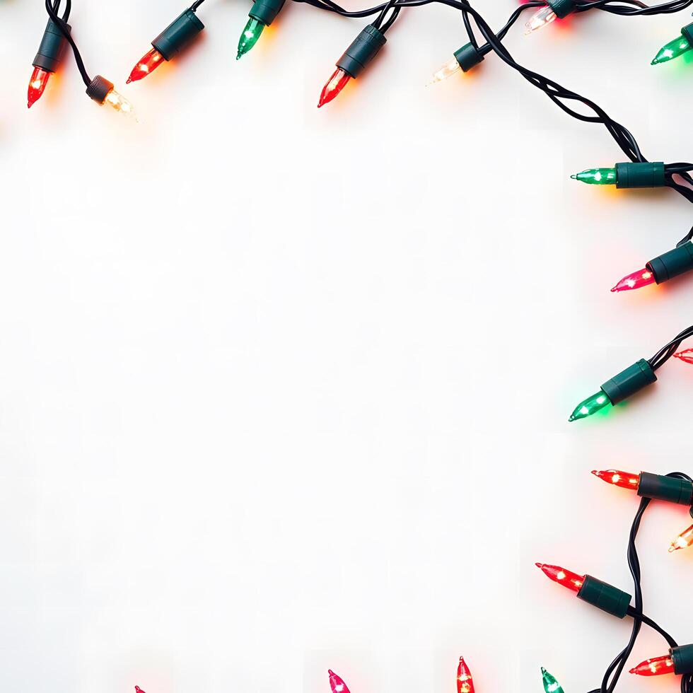 Colorful Christmas lights frame a white background, offering a festive and bright holiday border photo