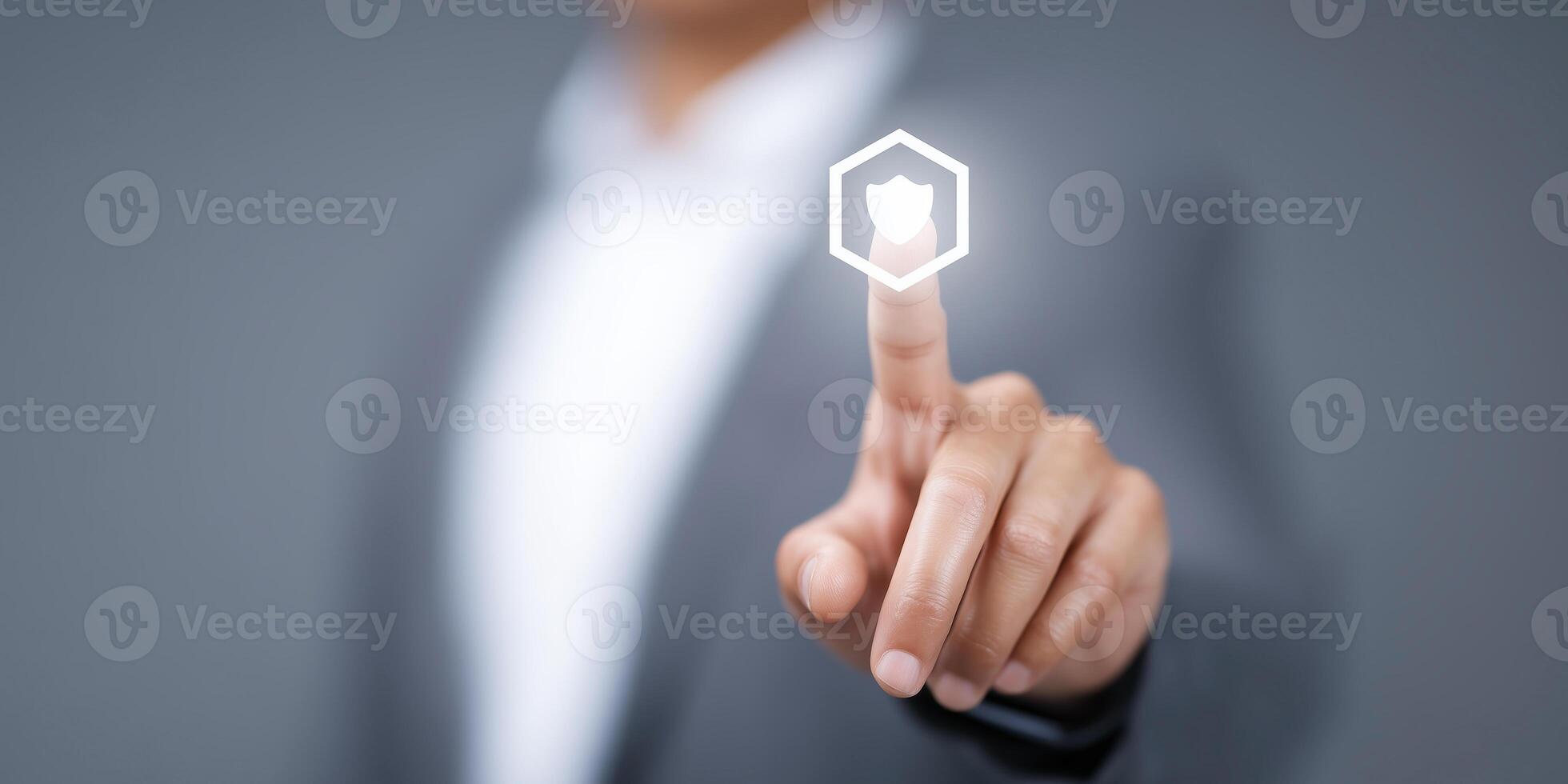 Business professional touching digital security icon on screen with blurred background showcasing technology and innovation concept photo