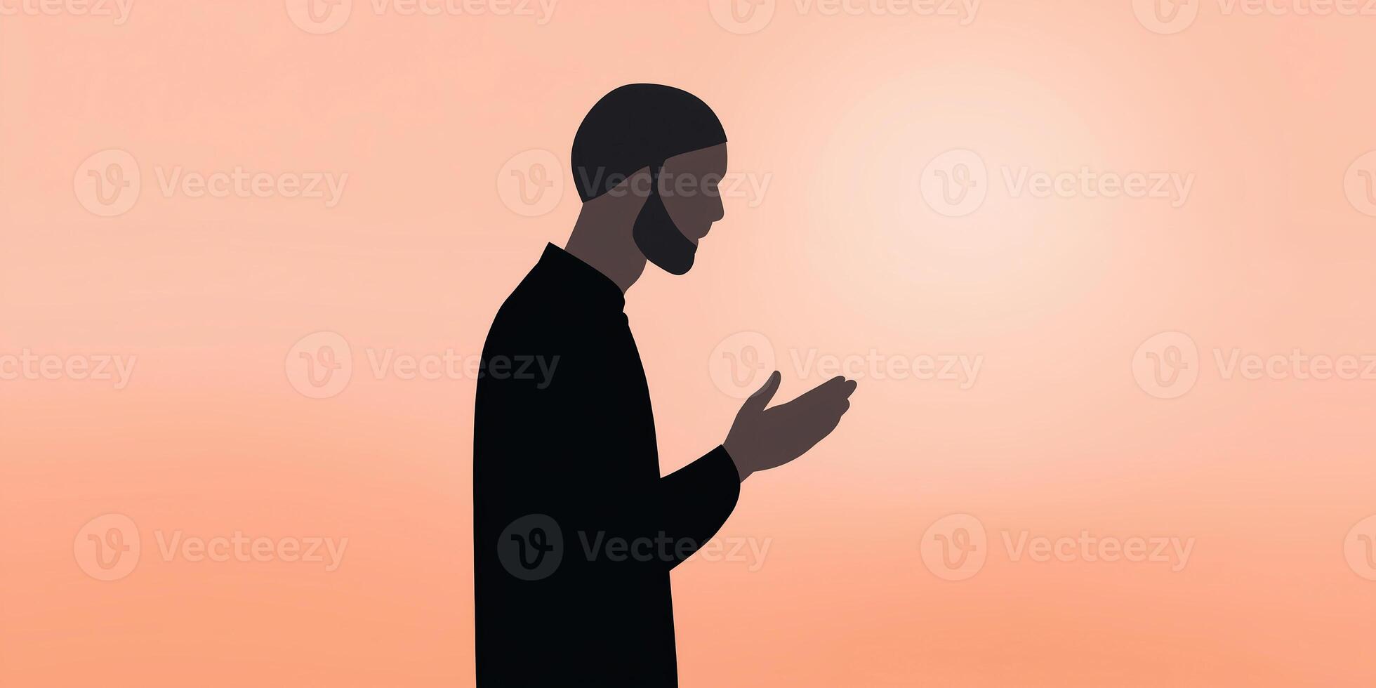 Man in silhouette praying with hands raised against a soft orange background, symbolizing spirituality and reflection, meditation and inner peace concept photo