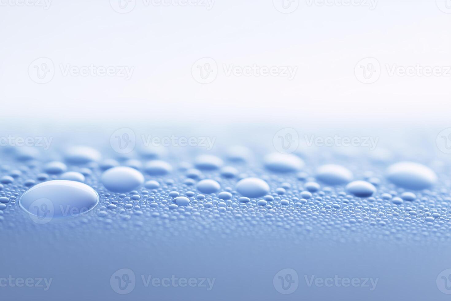 Water droplets on a surface with a blue background photo