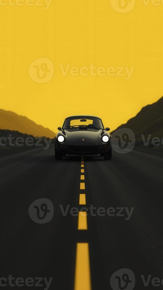 Black porsche 911 driving on asphalt road with yellow lines at sunset photo