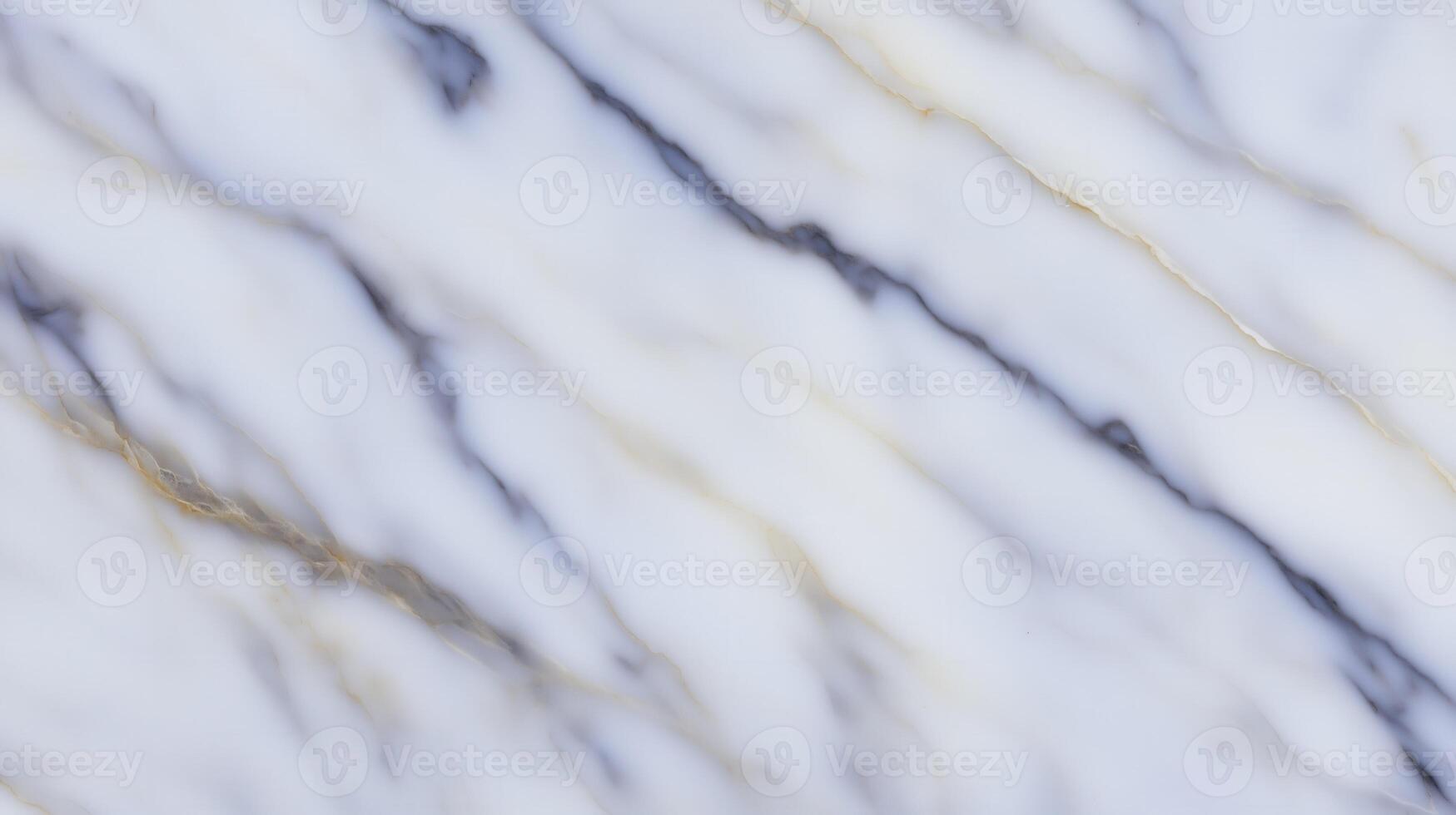 Elegant white and gold marble texture with subtle veining patterns photo
