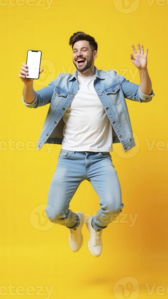 A man jumping in the air with a blank white cell phone photo