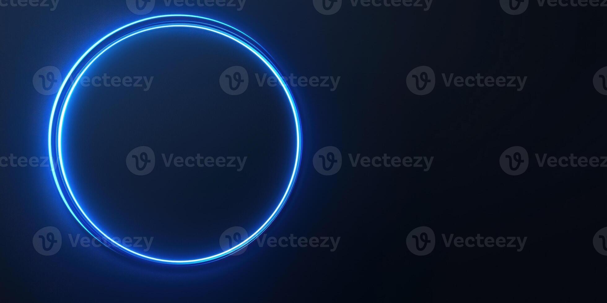 Bright neon blue circle glowing on dark background photo