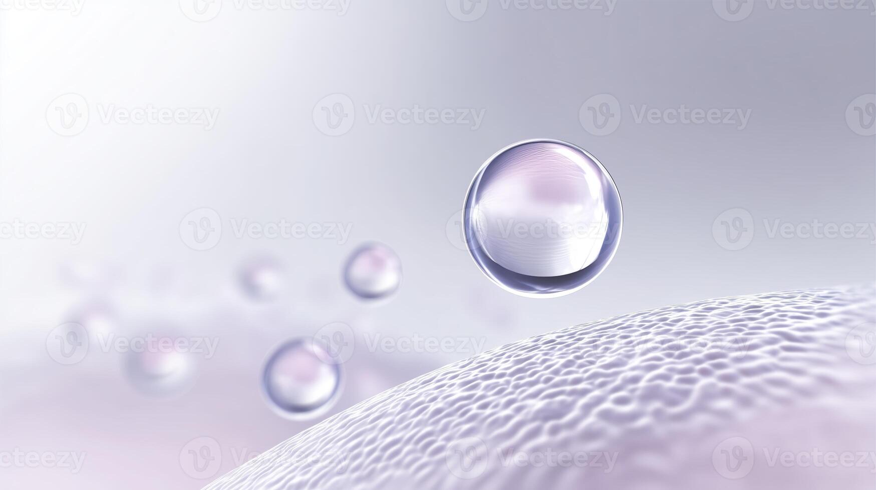 A close up of a drop of water on a white surface photo